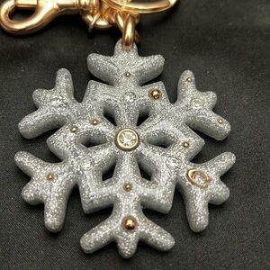 Coach Silver and Gold Snowflake Keychain limited edition vintage